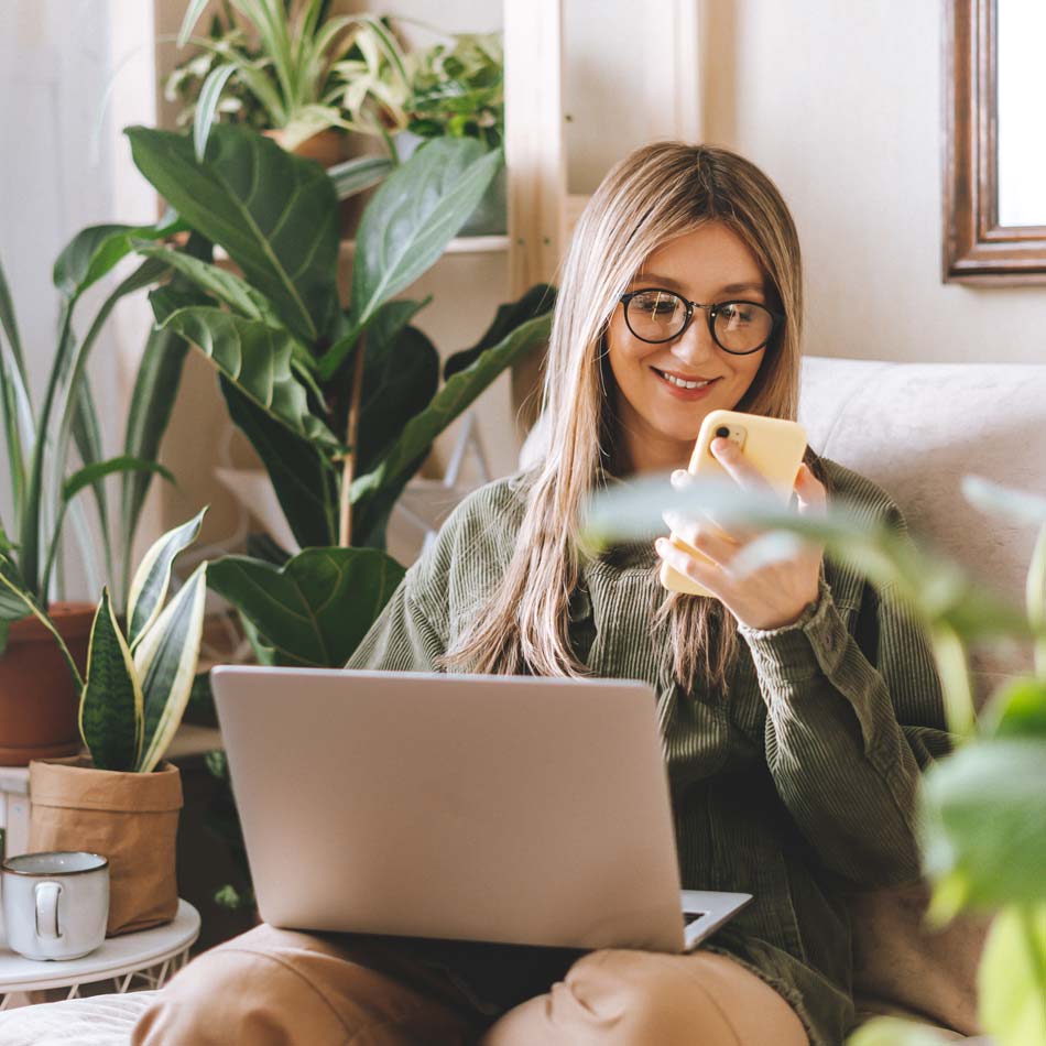 Young woman looking at computer.