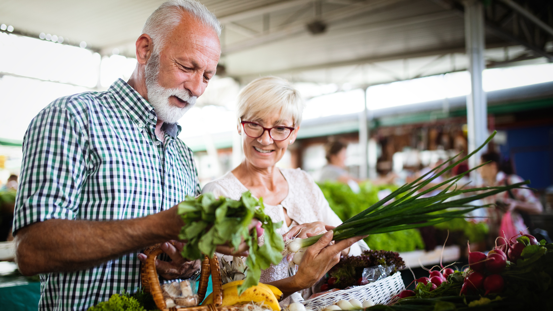 Older couple at farmers market.